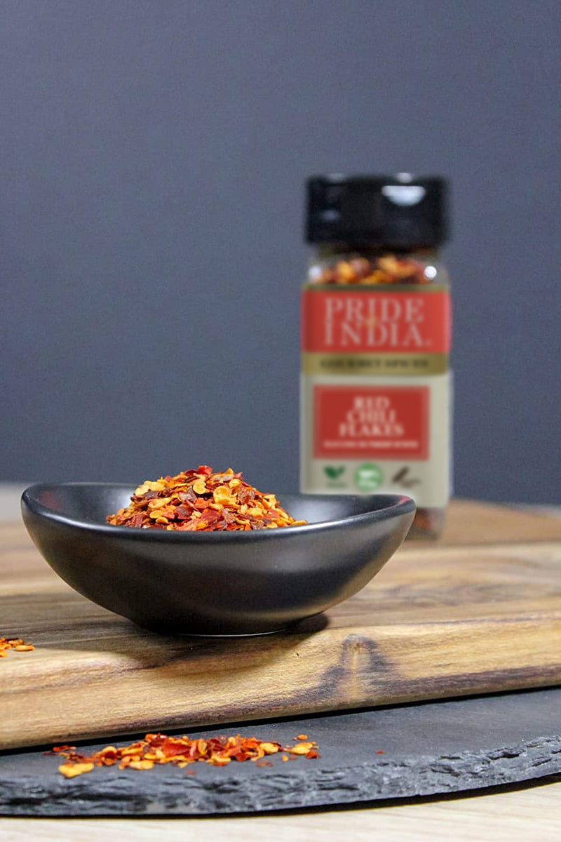 Pride of India - Red Chili Flakes - Gourmet Spice/ Culinary Must Have - Pleasant Heat/ Distinct Flavor & Aroma - Sprinkle onto Pizza/Pasta/Flatbread - Easy to Use - 1.6 oz. Small Dual Sifter Jar