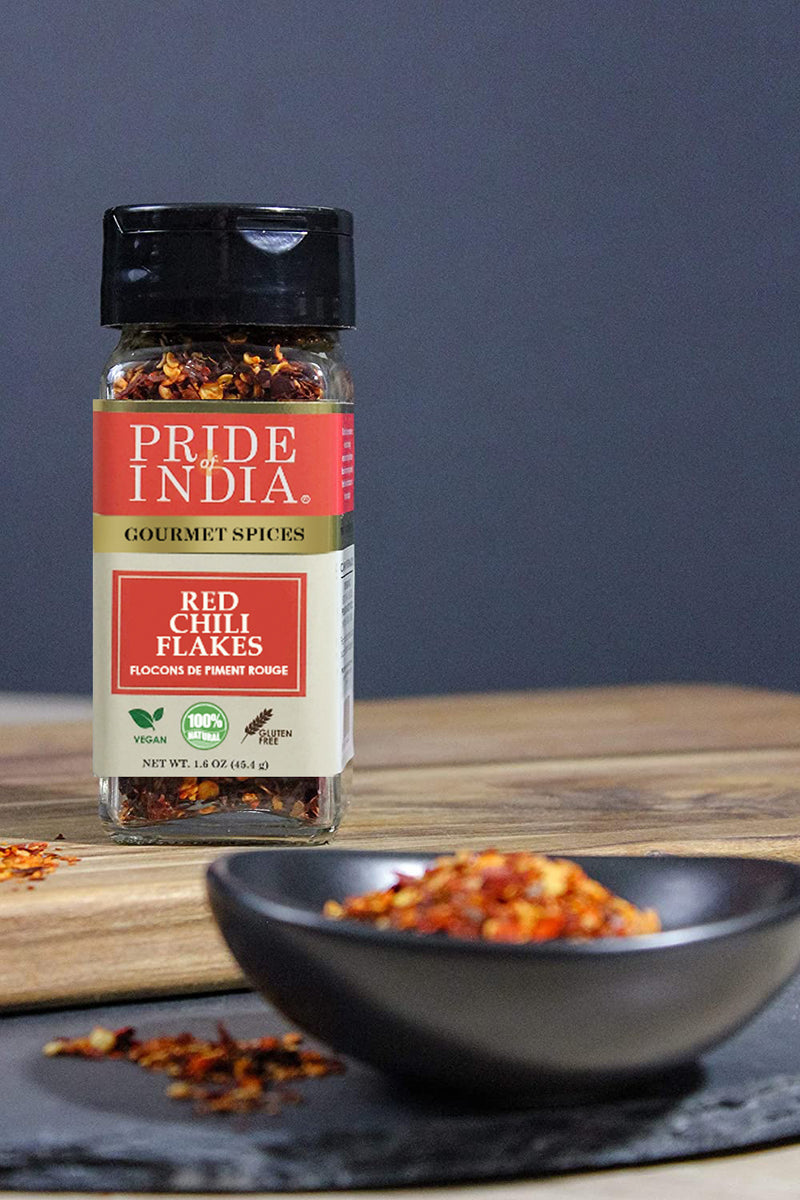 Pride of India - Red Chili Flakes - Gourmet Spice/ Culinary Must Have - Pleasant Heat/ Distinct Flavor & Aroma - Sprinkle onto Pizza/Pasta/Flatbread - Easy to Use - 1.6 oz. Small Dual Sifter Jar